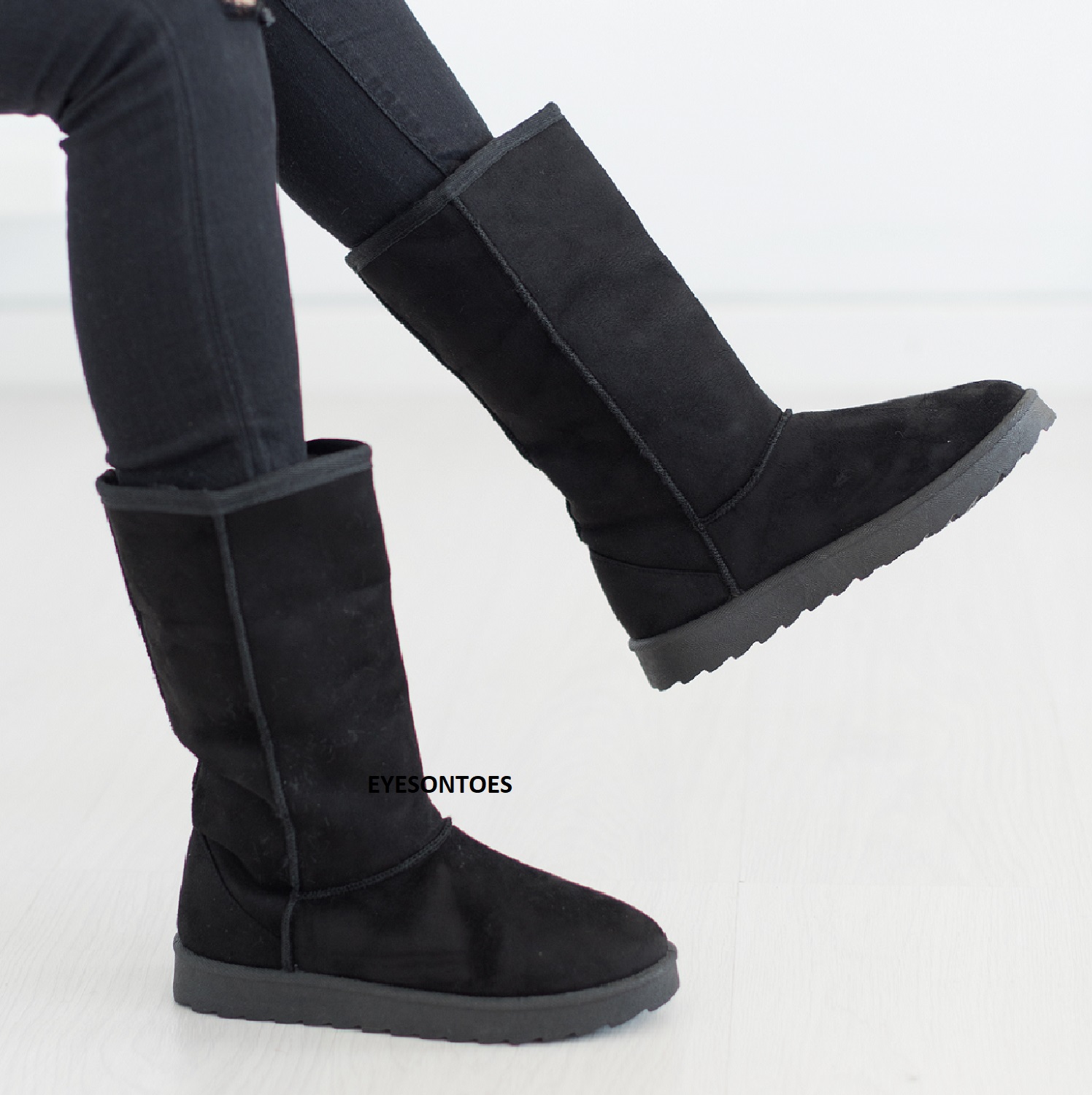black calf hugging boots